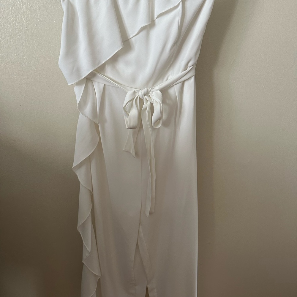 BRAND NEW without tags! Never worn! Elegant Ruffled Jumpsuit White Size S